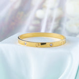 Radiant Sunburst Studded Golden Wrist Bangle