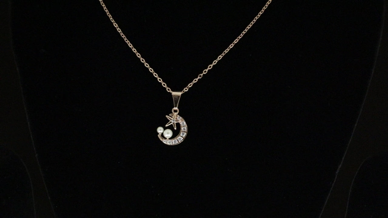 Crescent Moon bearing Pearls & studded Star Pendant